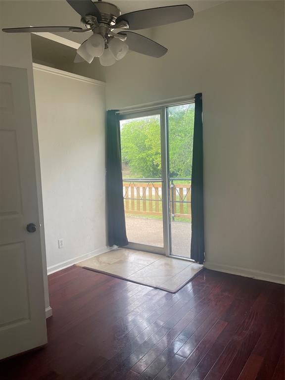 109 Fm 2280, Unit 111C Cleburne, TX 76031 - Photo 4 of 8 an empty room with windows and outdoor view