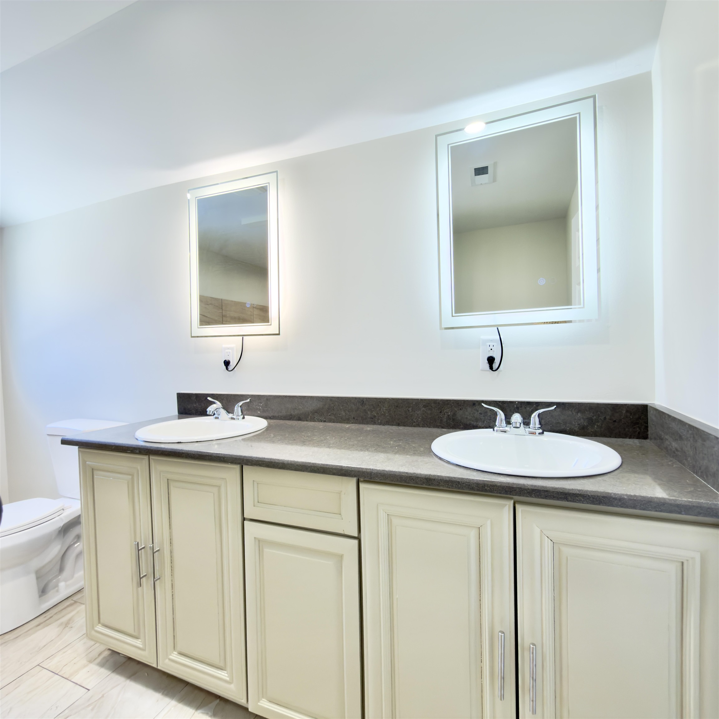 407 Allen Street Belvidere, IL 61008 - Photo 14 of 17 a bathroom with 2 sink and a mirror