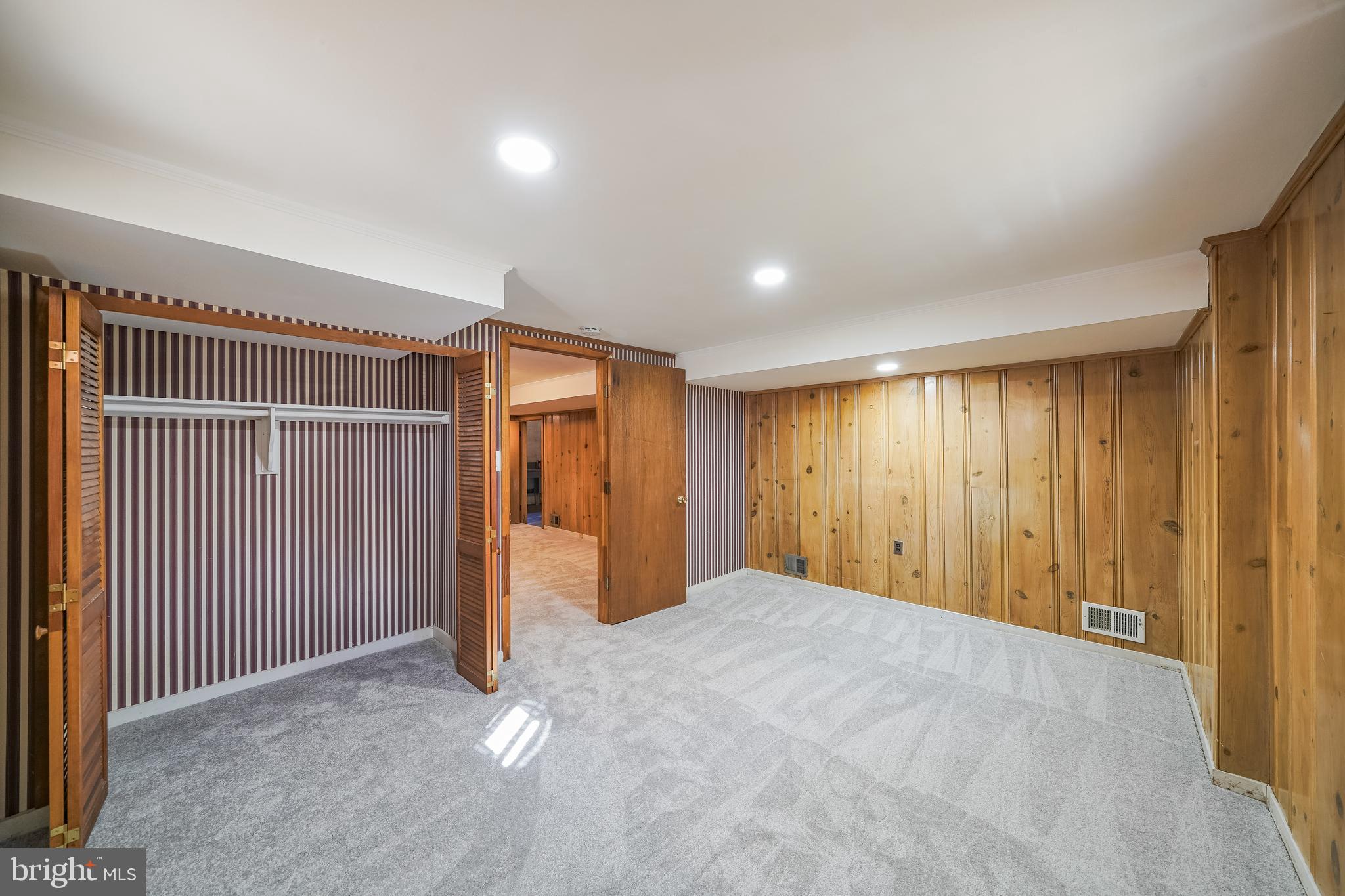 11500 Mapleview Drive Silver Spring, MD 20902 - Photo 30 of 32 a view of an empty room with wooden floor