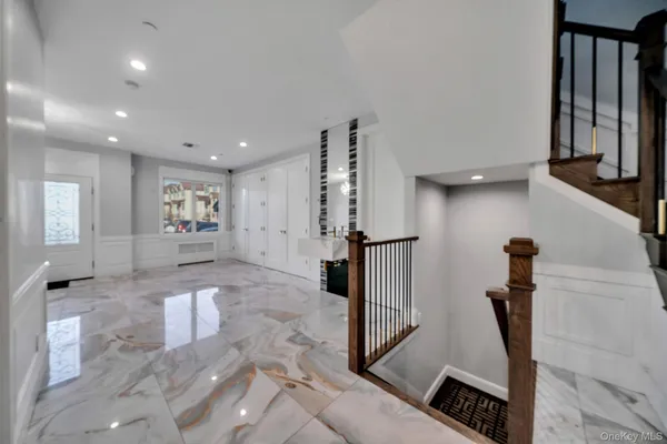 a kitchen with stainless steel appliances granite countertop a sink and a stove top oven