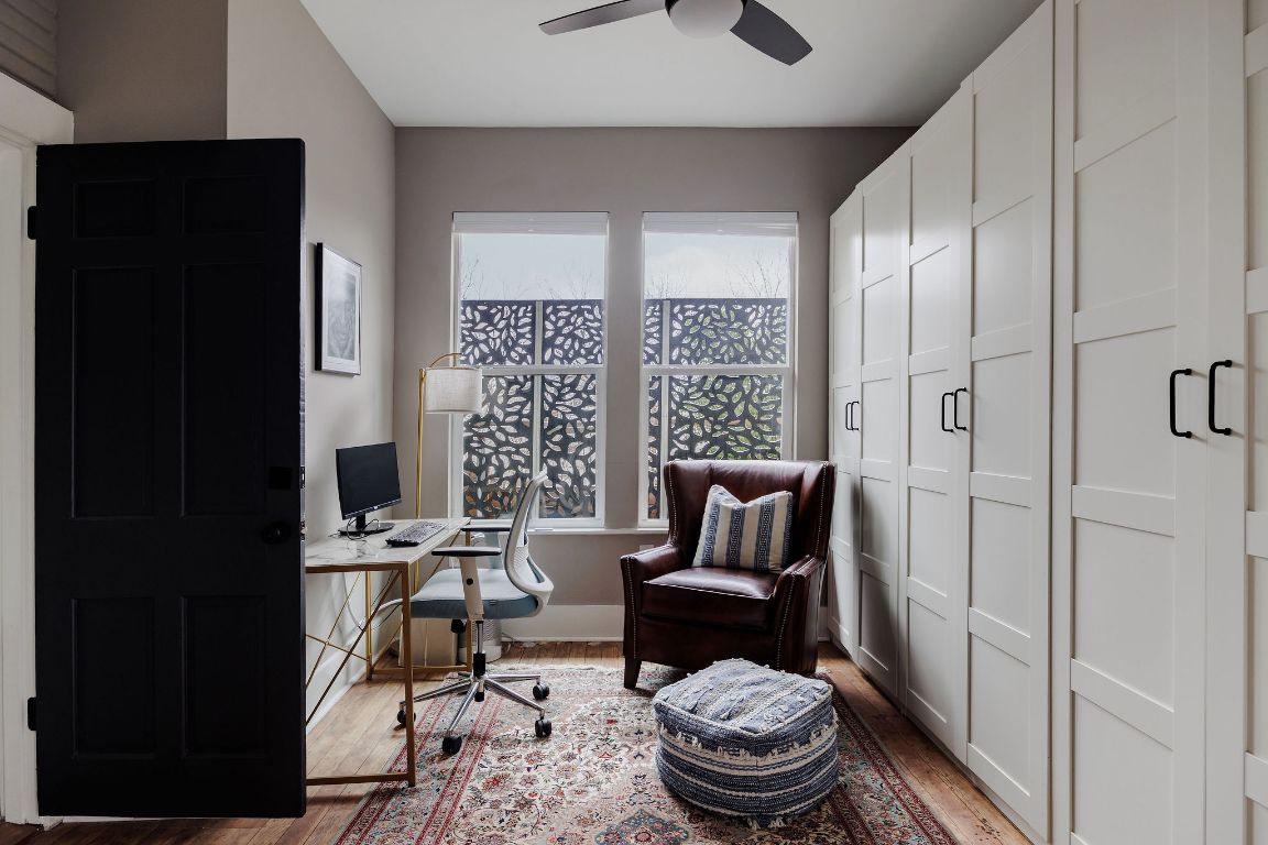 1907 Tillery Street Austin, TX 78723 - Photo 14 of 28 a living room with furniture and a gate