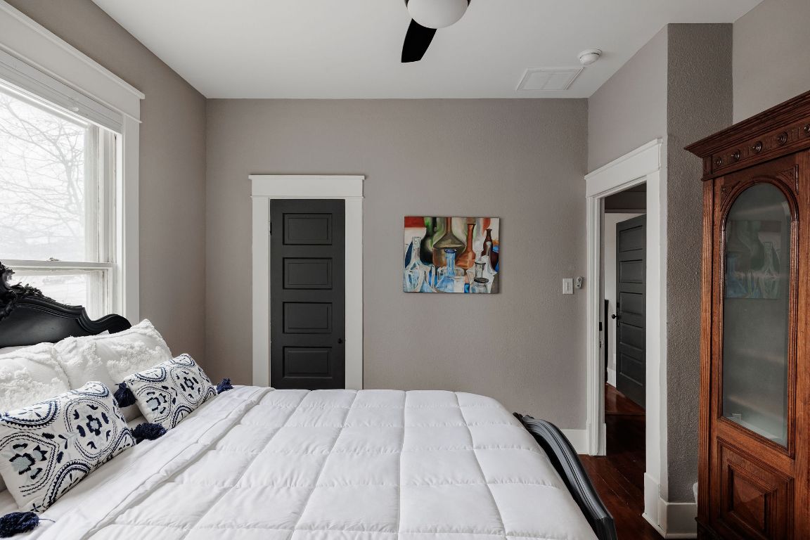 1907 Tillery Street Austin, TX 78723 - Photo 16 of 28 a bedroom with a large bed and a window