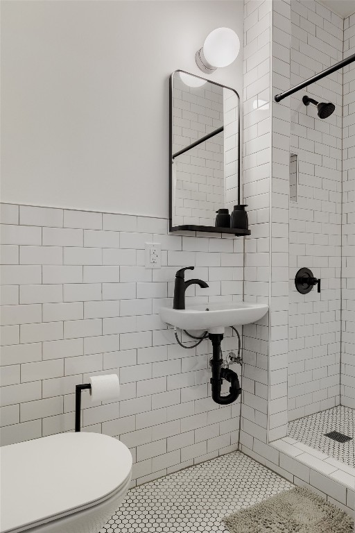 1907 Tillery Street Austin, TX 78723 - Photo 18 of 28 a bathroom with a toilet sink a mirror and shower