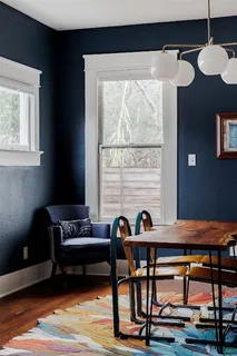 a view of hall way with furniture