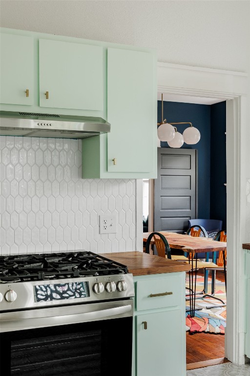 1907 Tillery Street Austin, TX 78723 - Photo 27 of 28 a stove top oven sitting inside of a kitchen
