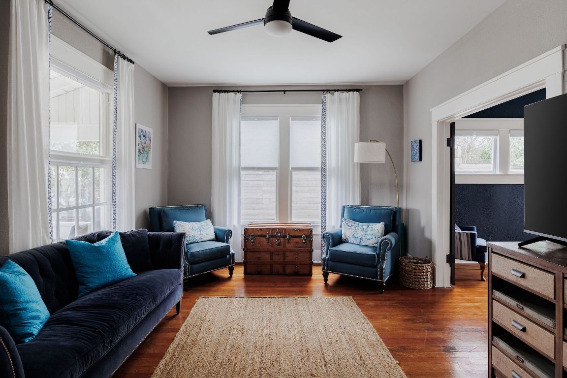 1907 Tillery Street Austin, TX 78723 - Photo 5 of 28 a living room with furniture and a window