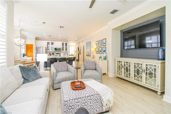 a living room with furniture and a table