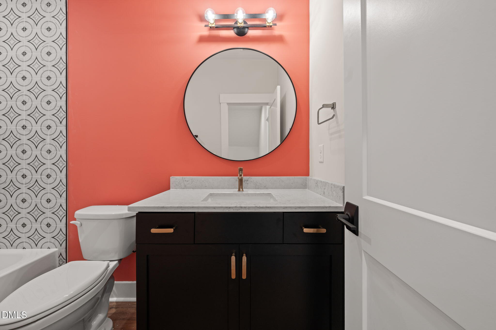 400 Pilot Ridge Road Zebulon, NC 27597 - Photo 39 of 51 a bathroom with a sink a toilet and mirror