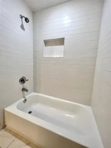 a bathroom with a bathtub