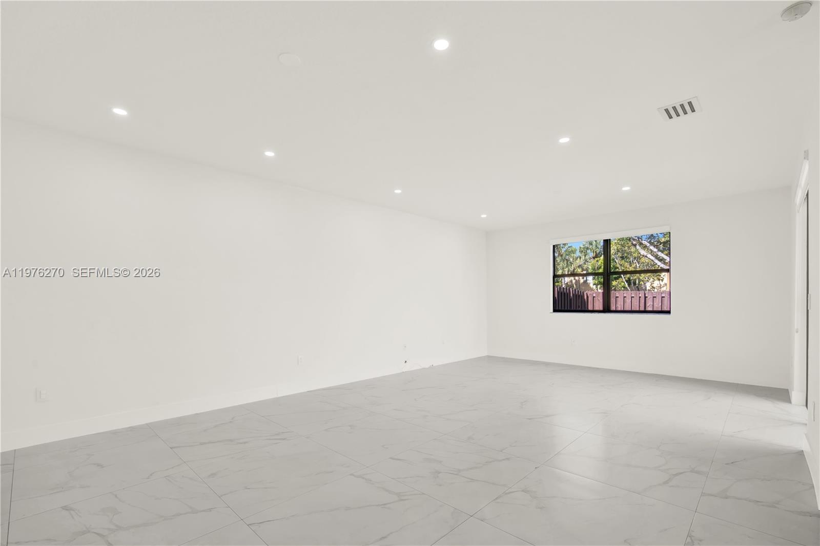 9243 Southwest 227th Terrace Cutler Bay, FL 33190 - Photo 27 of 32 a view of an empty room