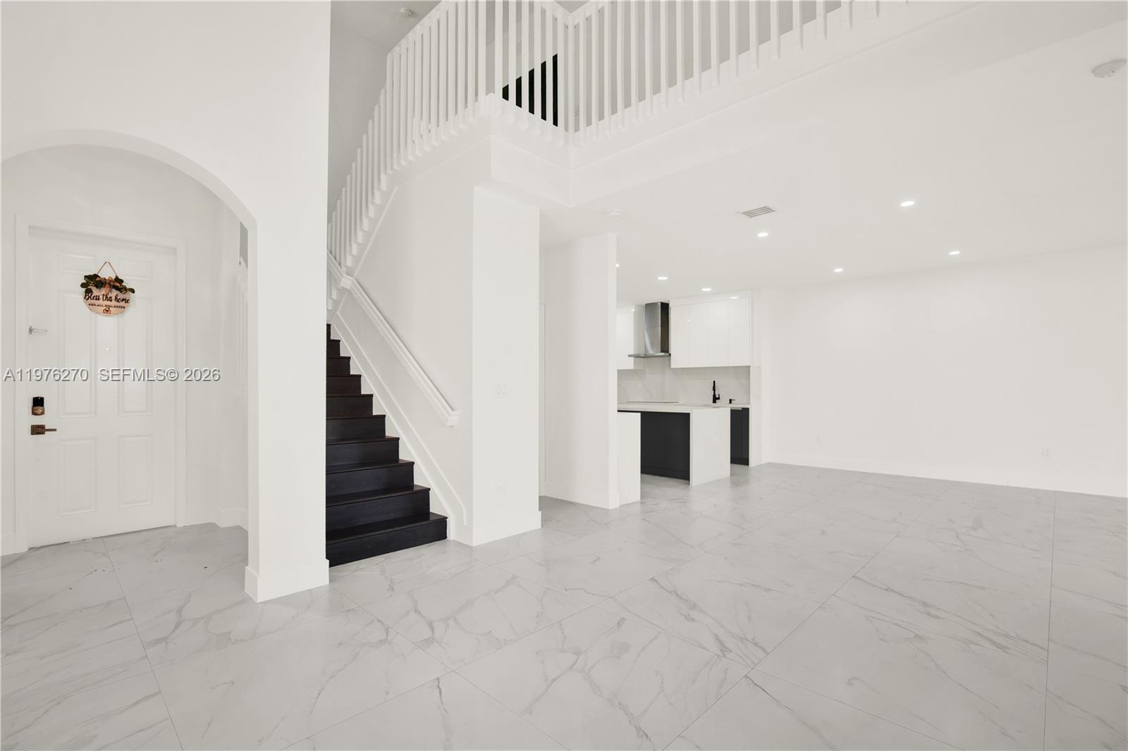 9243 Southwest 227th Terrace Cutler Bay, FL 33190 - Photo 29 of 32 a view of kitchen with sink and cabinets