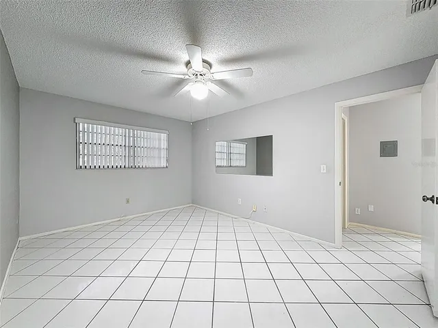 a bathroom with a toilet a sink and shower