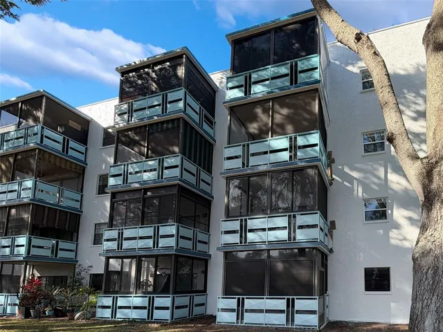 a view of a house with swimming pool