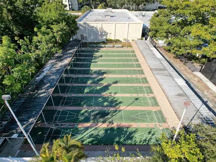 a view of a gym with gym equipment