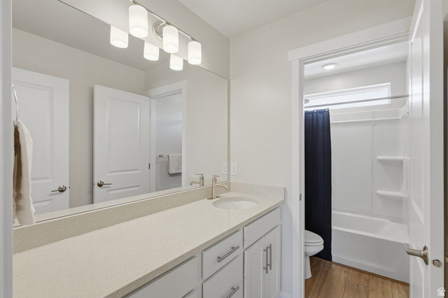 1353 Mapleton Hts Court Mapleton, UT 84664 - Photo 29 of 50 Full bathroom with vanity, light wood-style flooring, and shower / bath combination with curtain