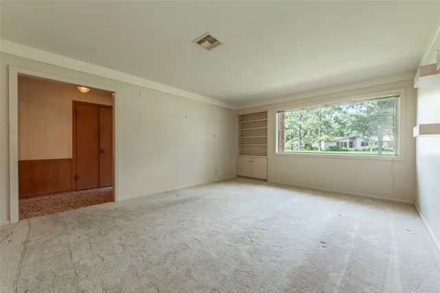 an empty room with windows