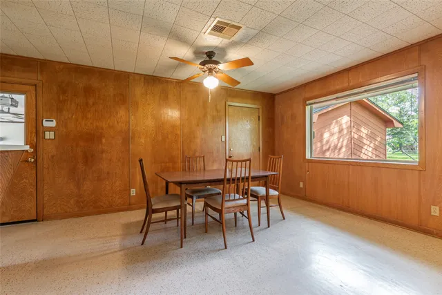 a kitchen with stainless steel appliances granite countertop a sink and cabinets