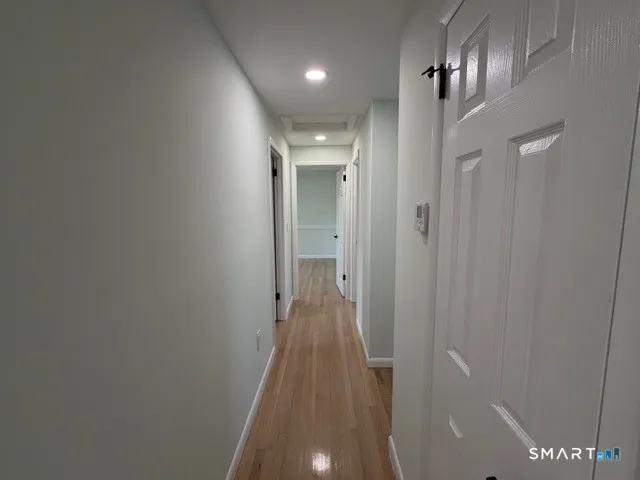 a view of hallway with stairs