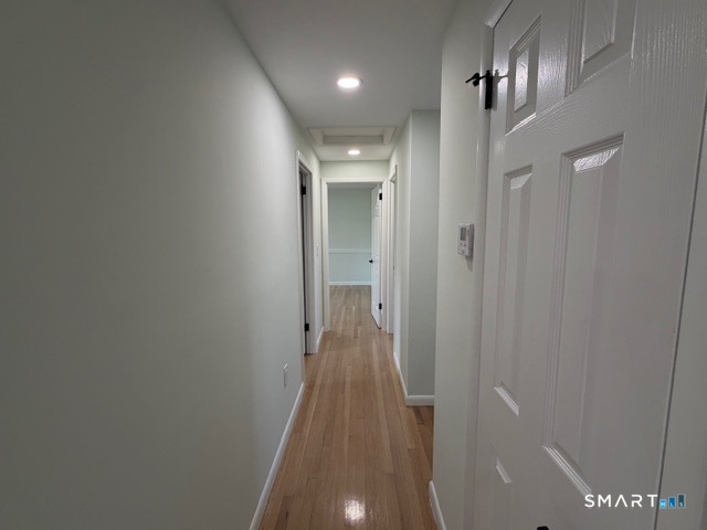 26 Kelly Road Hamden, CT 06518 - Photo 18 of 38 a view of hallway with stairs