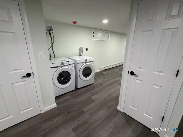 a utility room with dryer and washer