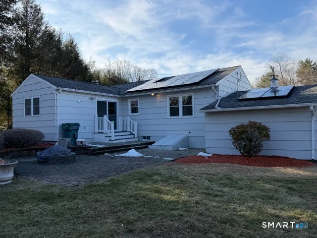 a view of a house with a patio