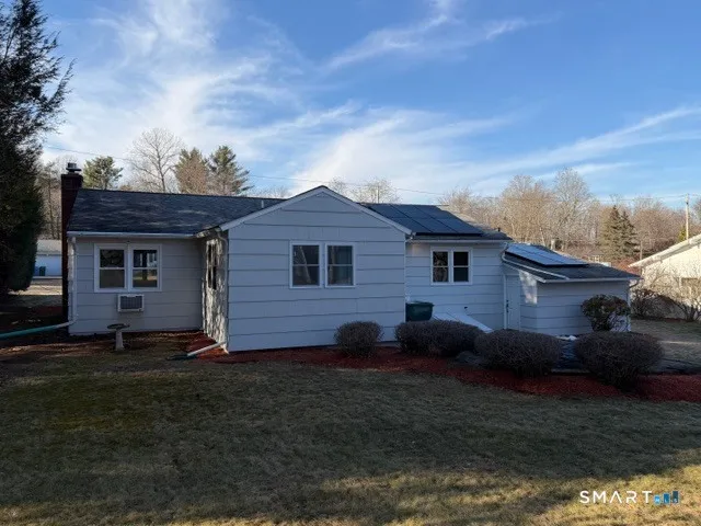 a view of a back yard of the house