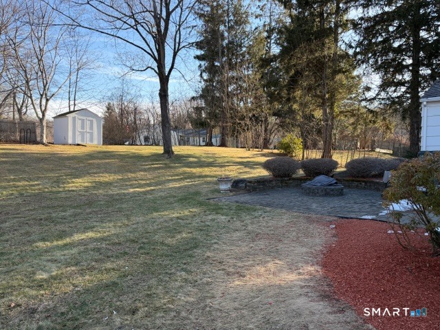 26 Kelly Road Hamden, CT 06518 - Photo 6 of 38 a view of road with trees