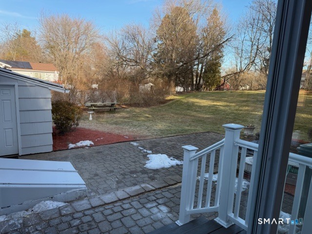 26 Kelly Road Hamden, CT 06518 - Photo 7 of 38 a view of a wooden deck besides a house