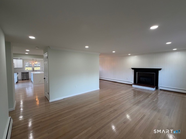 26 Kelly Road Hamden, CT 06518 - Photo 9 of 38 a view of empty room with wooden floor