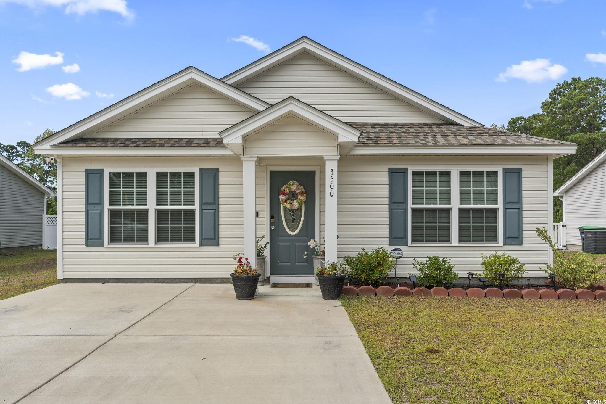 3500 Church Street Loris, SC 29569 - Photo 1 of 30 Bungalow-style home with a shingled roof and a fro