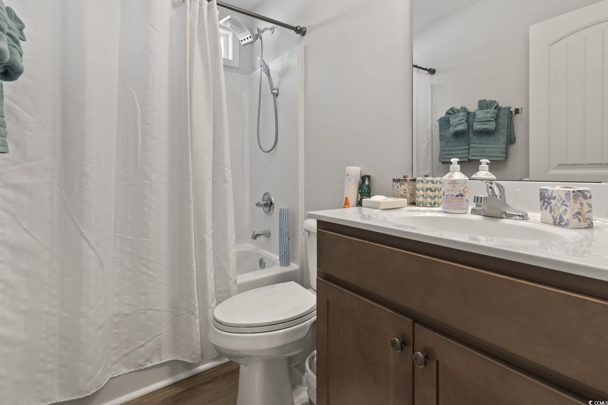 3500 Church Street Loris, SC 29569 - Photo 11 of 30 Bathroom with toilet, shower / bath combo with sho