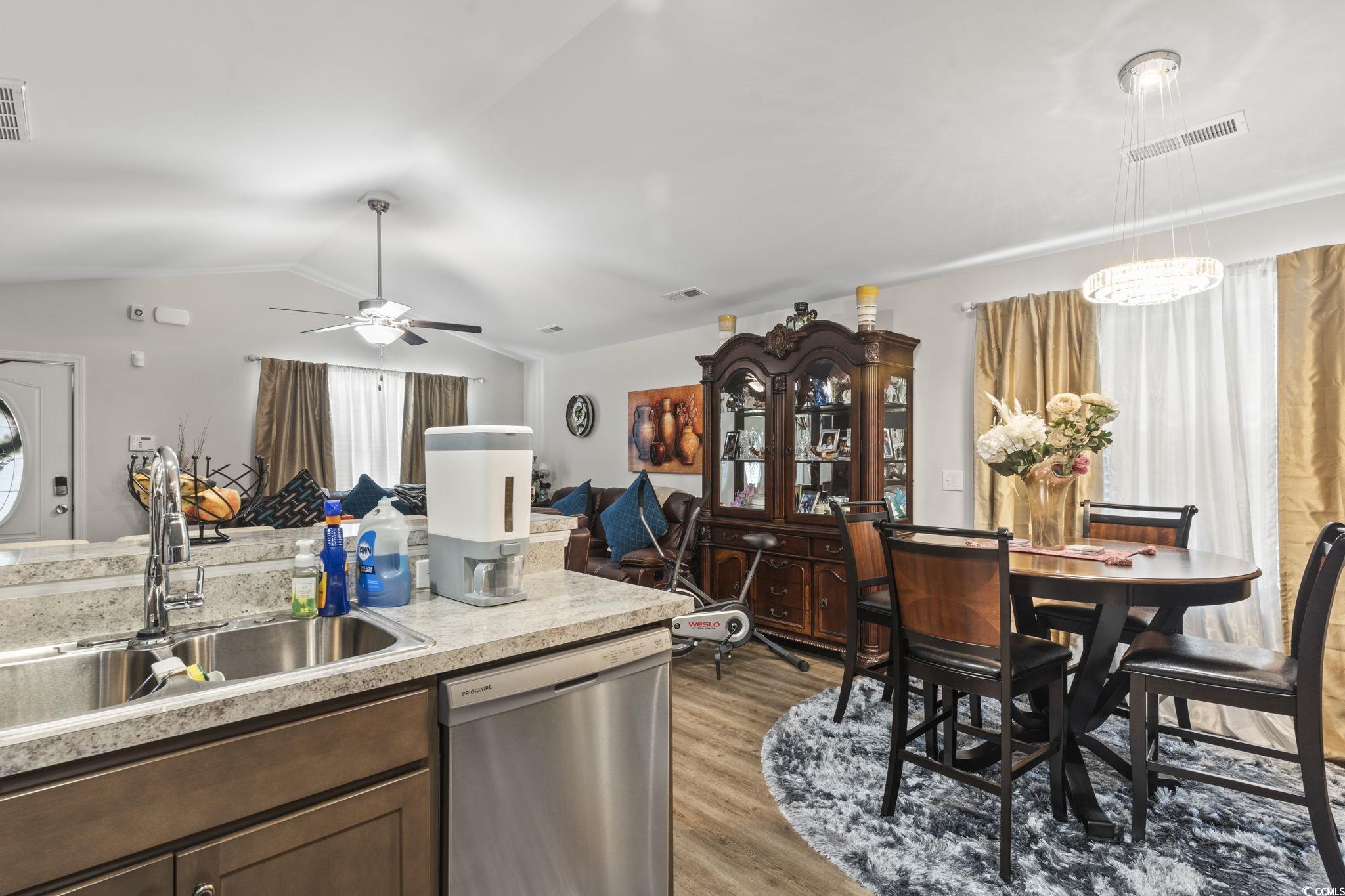 3500 Church Street Loris, SC 29569 - Photo 13 of 30 Kitchen featuring lofted ceiling, a sink, visible