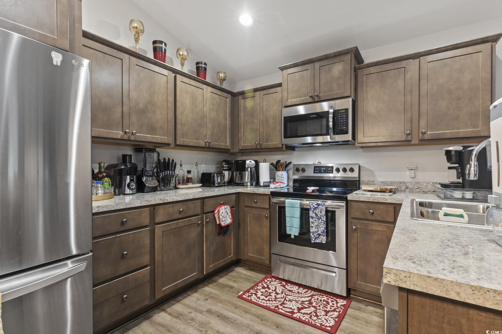 3500 Church Street Loris, SC 29569 - Photo 16 of 30 Kitchen with light wood finished floors, light cou