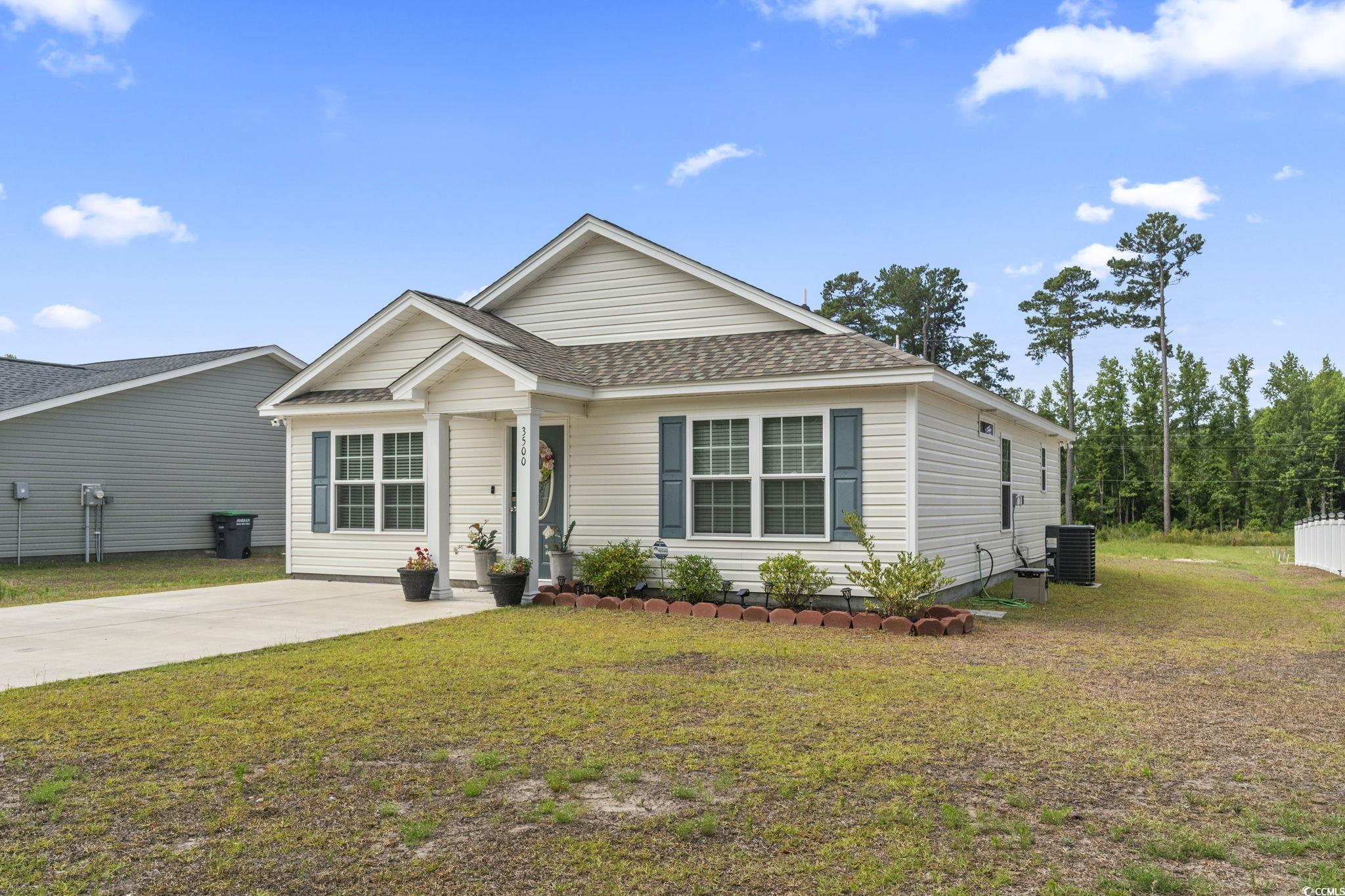 3500 Church Street Loris, SC 29569 - Photo 2 of 30 View of front of home featuring a shingled roof, a
