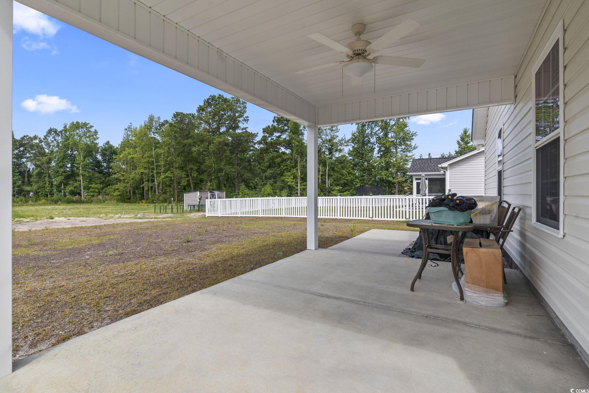 3500 Church Street Loris, SC 29569 - Photo 23 of 30 View of patio / terrace with ceiling fan and fence