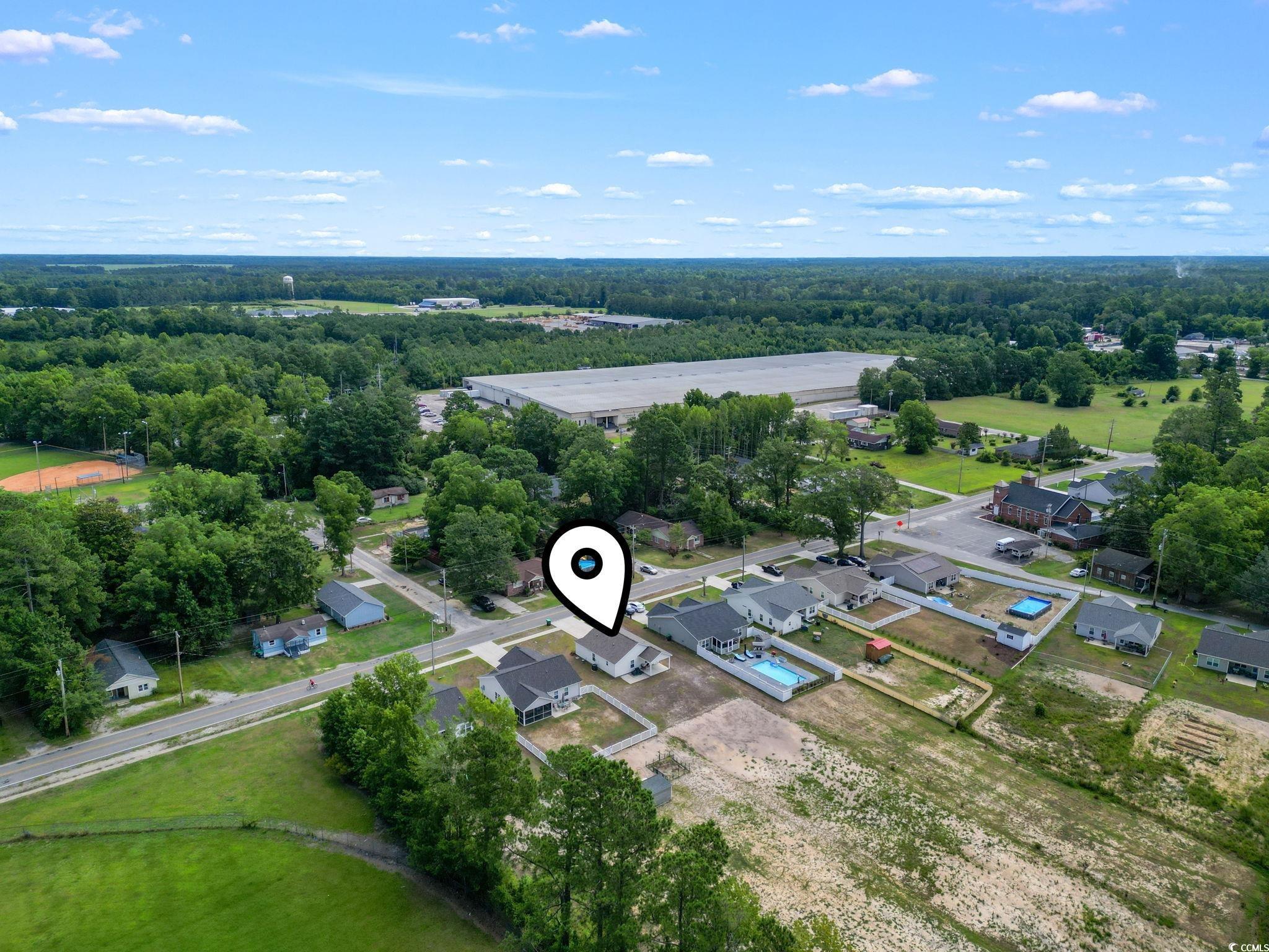 3500 Church Street Loris, SC 29569 - Photo 27 of 30 Drone / aerial view with a view of trees