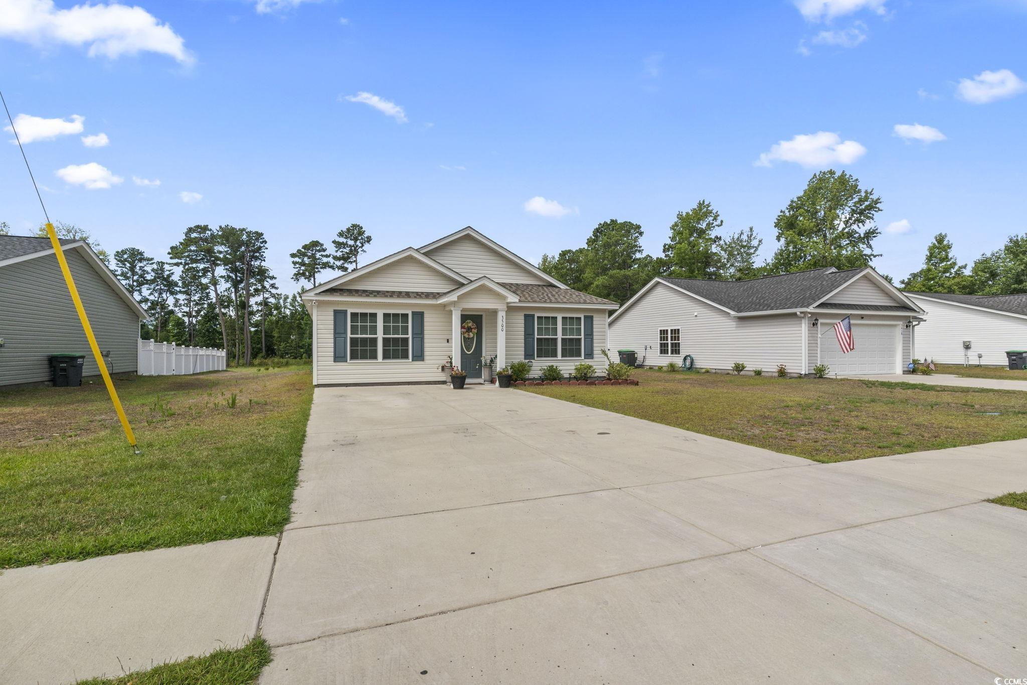 3500 Church Street Loris, SC 29569 - Photo 3 of 30 View of front facade featuring a garage, concrete