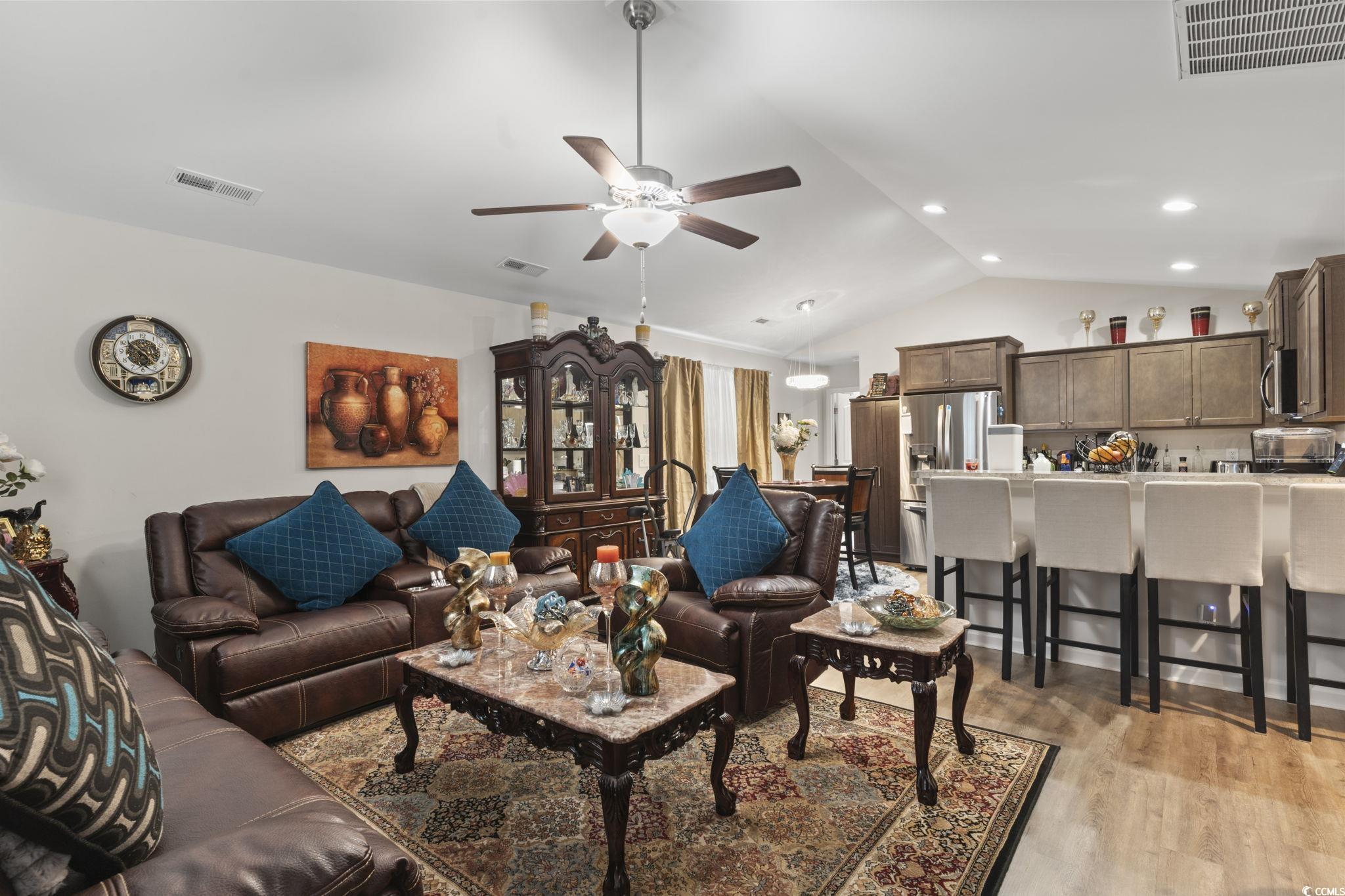 3500 Church Street Loris, SC 29569 - Photo 7 of 30 Living area featuring visible vents, vaulted ceili