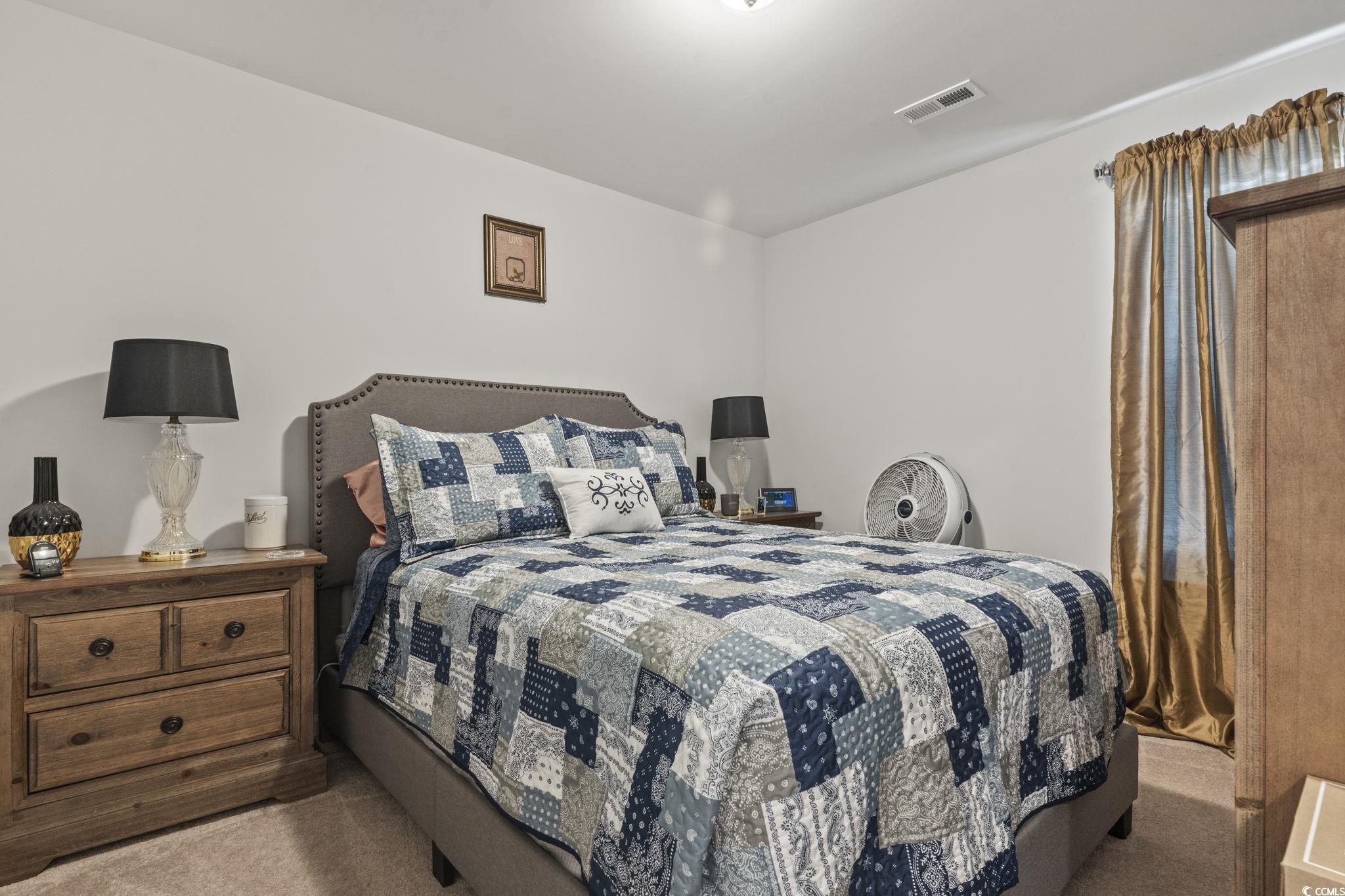3500 Church Street Loris, SC 29569 - Photo 10 of 30 Bedroom featuring visible vents and carpet floorin