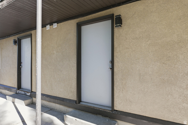 831 Lennox Street, Unit 5 Midvale, UT 84047 - Photo 5 of 19 Entrance to property with stucco siding