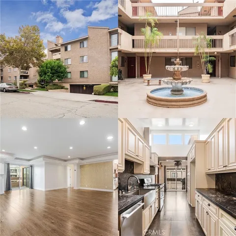 a lobby with furniture and a kitchen view