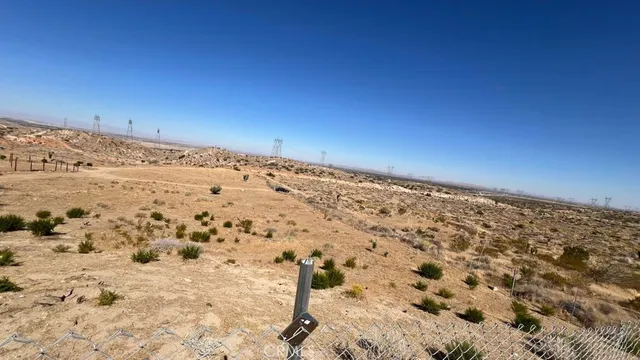 a view of a large mountain with a lake view