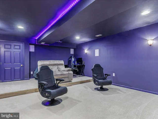 a view of a chairs on the roof deck