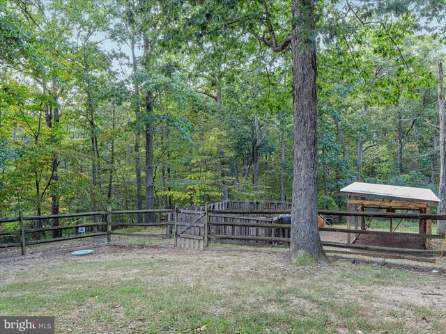 a view of a chair and table in the balcony