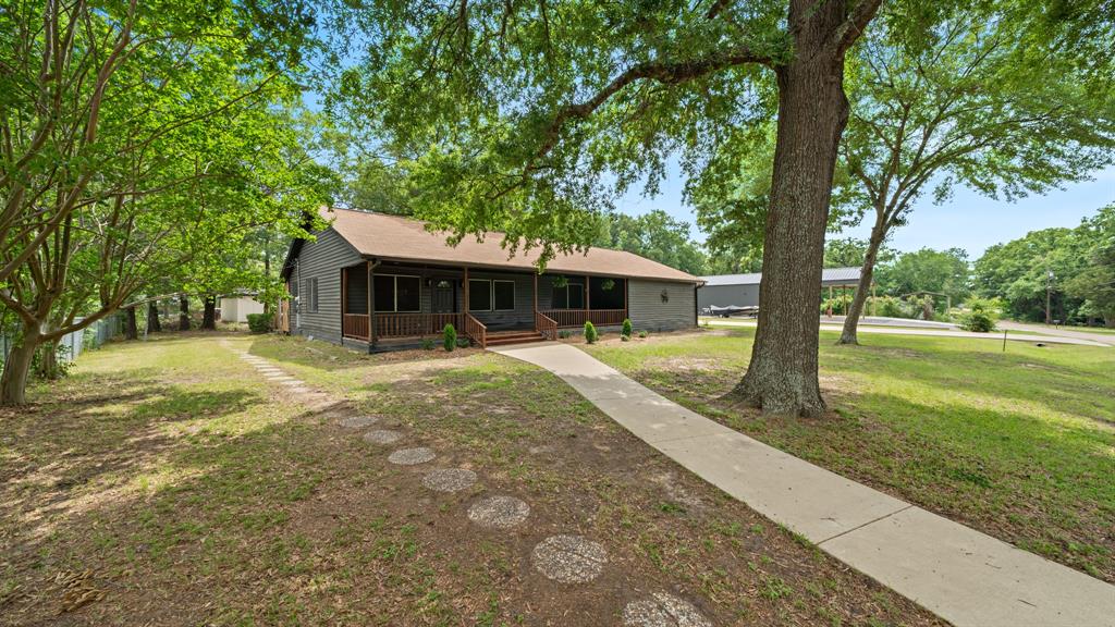 129 King Arthur Road Mabank, TX 75156 - Photo 2 of 33 a view of a house with a yard