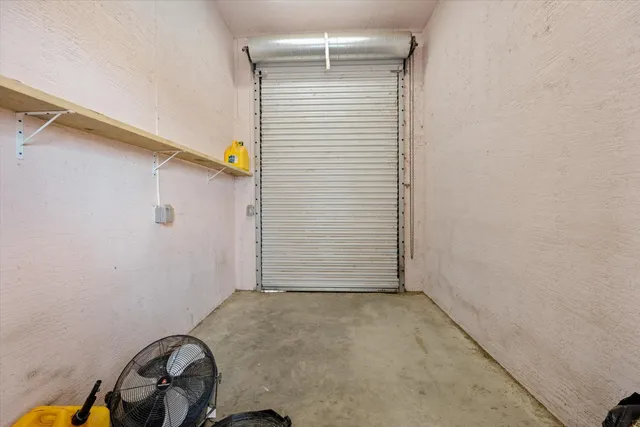 a view of a hallway with stairs