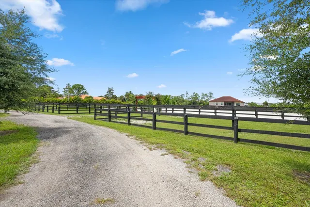 a view of a lake with a big yard