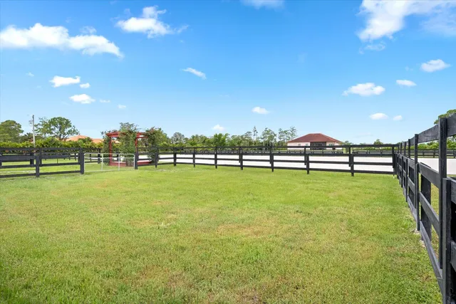 a view of lake with green space