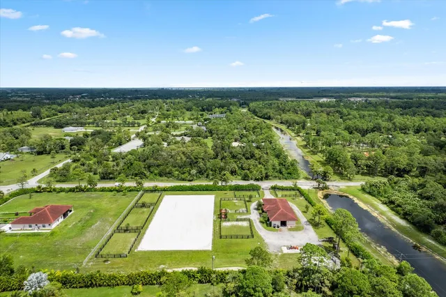 a view of an outdoor space pool patio and outdoor seating