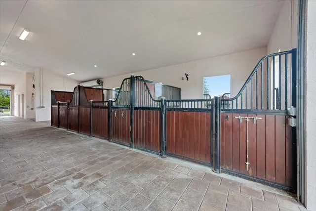 a view of a hallway with a door